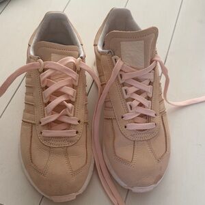 adidas Women’s Light Pink Suede Sneakers